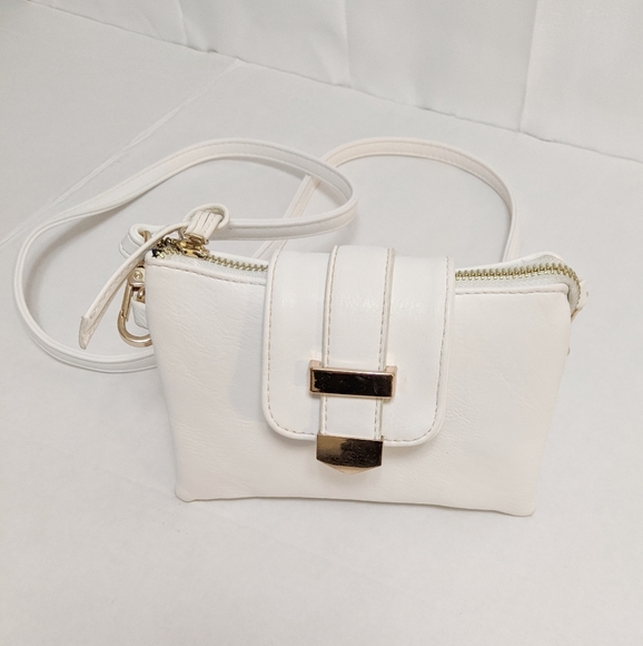 Charming Charlie Handbags - 3/$18 charming Charlie white small purse